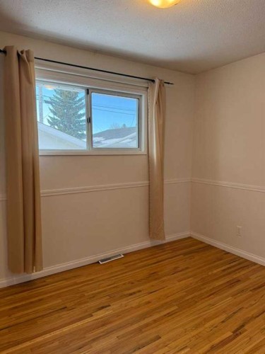 37 Arbour Crescent Se, Calgary, AB - Indoor Photo Showing Other Room