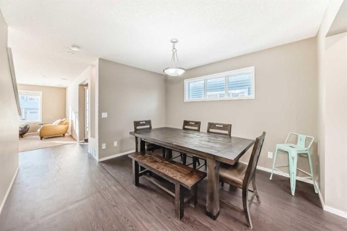 145 River Heights Crescent, Cochrane, AB - Indoor Photo Showing Dining Room