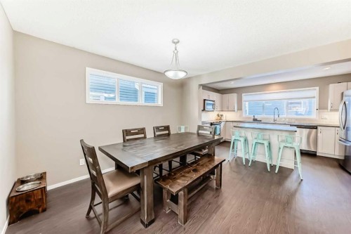 145 River Heights Crescent, Cochrane, AB - Indoor Photo Showing Dining Room