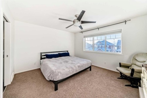 145 River Heights Crescent, Cochrane, AB - Indoor Photo Showing Bedroom
