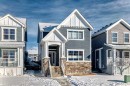 145 River Heights Crescent, Cochrane, AB  - Outdoor With Facade 