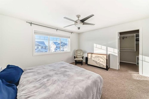 145 River Heights Crescent, Cochrane, AB - Indoor Photo Showing Bedroom