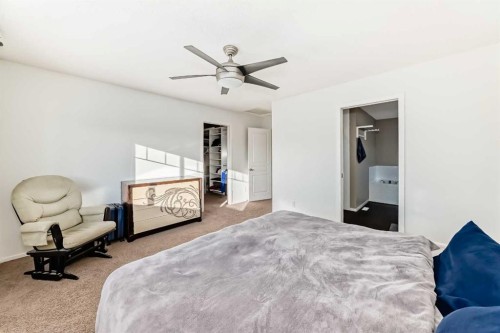 145 River Heights Crescent, Cochrane, AB - Indoor Photo Showing Bedroom