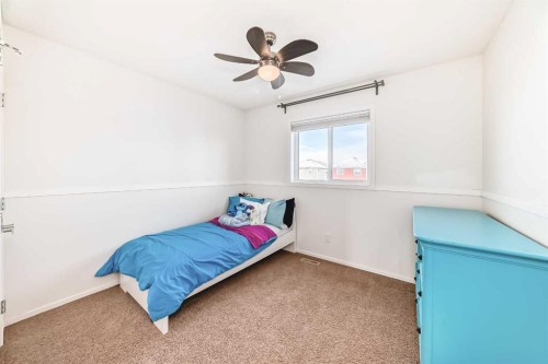 145 River Heights Crescent, Cochrane, AB - Indoor Photo Showing Bedroom