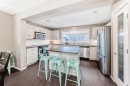 145 River Heights Crescent, Cochrane, AB  - Indoor Photo Showing Kitchen With Stainless Steel Kitchen 