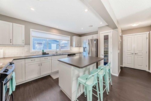 145 River Heights Crescent, Cochrane, AB - Indoor Photo Showing Kitchen
