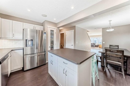 145 River Heights Crescent, Cochrane, AB - Indoor Photo Showing Kitchen With Stainless Steel Kitchen