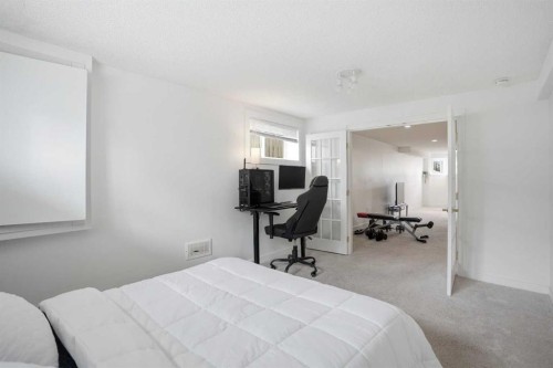 113 Mt Lorette Place Se, Calgary, AB - Indoor Photo Showing Bedroom
