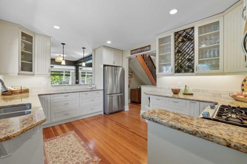 602 Macleod Trail Sw, High River, AB - Indoor Photo Showing Kitchen With Double Sink With Upgraded Kitchen