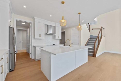 185 South Shore View, Chestermere, AB - Indoor Photo Showing Kitchen With Upgraded Kitchen