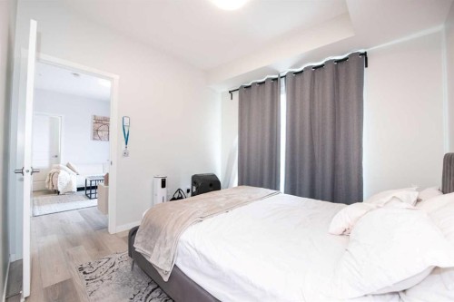 2303-220 Seton Grove Se, Calgary, AB - Indoor Photo Showing Bedroom