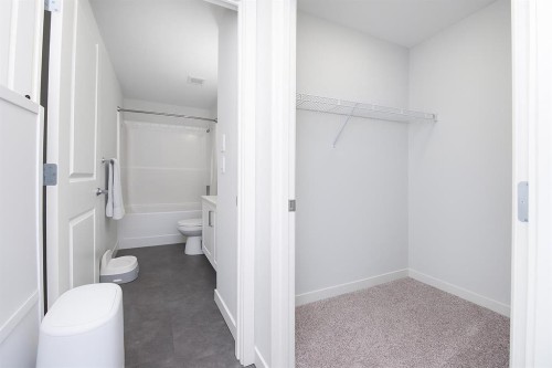 2303-220 Seton Grove Se, Calgary, AB - Indoor Photo Showing Bathroom