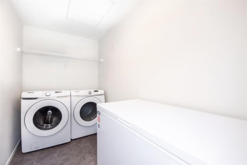 2303-220 Seton Grove Se, Calgary, AB - Indoor Photo Showing Laundry Room