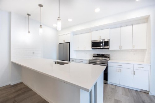 2303-220 Seton Grove Se, Calgary, AB - Indoor Photo Showing Kitchen With Upgraded Kitchen