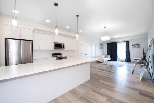 2303-220 Seton Grove Se, Calgary, AB - Indoor Photo Showing Kitchen With Stainless Steel Kitchen With Upgraded Kitchen