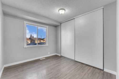 36 Falton Court Ne, Calgary, AB - Indoor Photo Showing Other Room