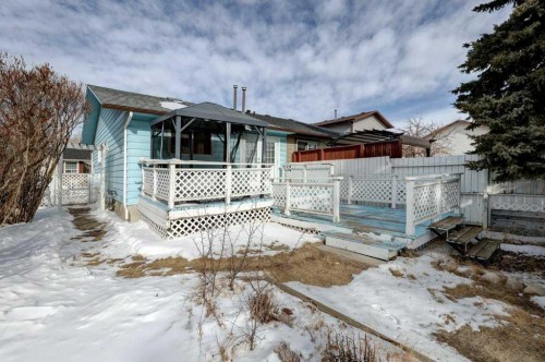 27 Castleglen Road Ne, Calgary, AB - Outdoor With Deck Patio Veranda
