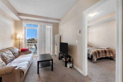 312-117 Copperpond Common Se, Calgary, AB - Indoor Photo Showing Living Room