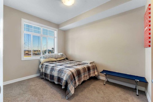 312-117 Copperpond Common Se, Calgary, AB - Indoor Photo Showing Bedroom