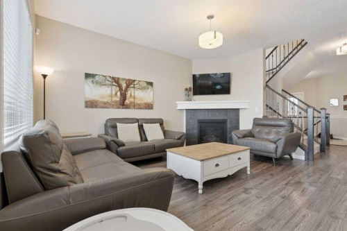 352 Skyview Shores Manor Ne, Calgary, AB - Indoor Photo Showing Living Room With Fireplace