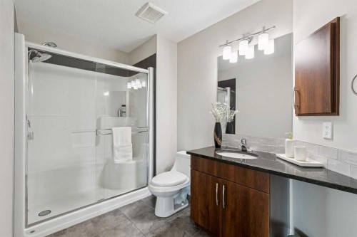 2302-15 Sunset Square, Cochrane, AB - Indoor Photo Showing Bathroom