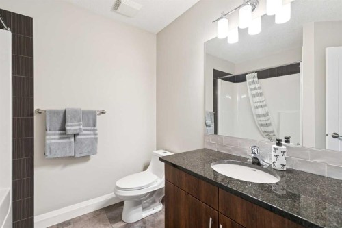 2302-15 Sunset Square, Cochrane, AB - Indoor Photo Showing Bathroom
