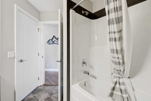 2302-15 Sunset Square, Cochrane, AB - Indoor Photo Showing Bathroom