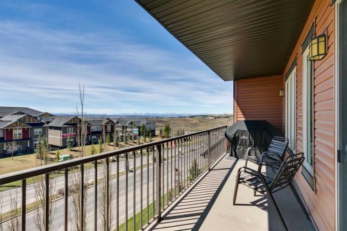 2302-15 Sunset Square, Cochrane, AB - Outdoor With Balcony With Exterior