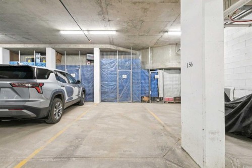 2302-15 Sunset Square, Cochrane, AB - Indoor Photo Showing Garage