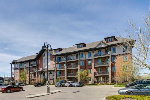 2302-15 Sunset Square, Cochrane, AB - Outdoor With Balcony With Facade