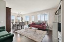 2302-15 Sunset Square, Cochrane, AB  - Indoor Photo Showing Living Room 