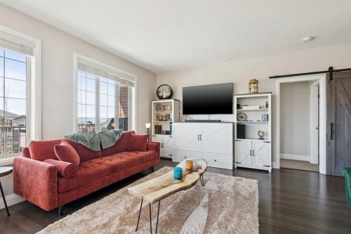 2302-15 Sunset Square, Cochrane, AB - Indoor Photo Showing Living Room