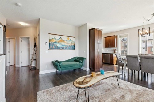 2302-15 Sunset Square, Cochrane, AB - Indoor Photo Showing Living Room