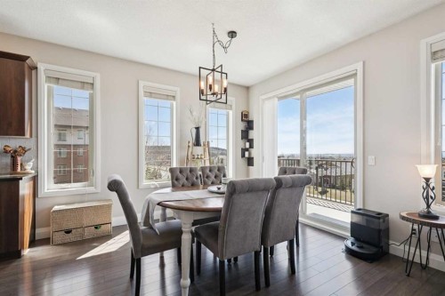 2302-15 Sunset Square, Cochrane, AB - Indoor Photo Showing Dining Room