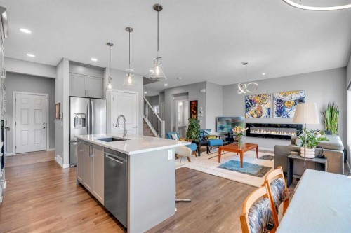 29 Masters Terrace Se, Calgary, AB - Indoor Photo Showing Kitchen With Fireplace With Upgraded Kitchen