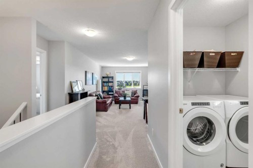 29 Masters Terrace Se, Calgary, AB - Indoor Photo Showing Laundry Room