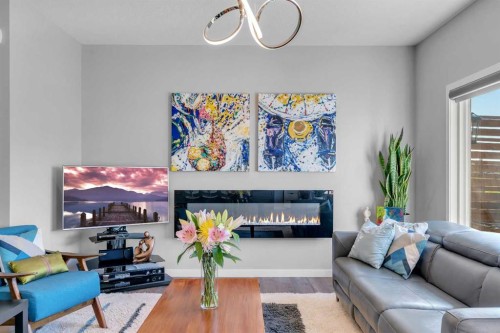 29 Masters Terrace Se, Calgary, AB - Indoor Photo Showing Living Room With Fireplace
