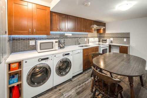 5808 Dalton Drive Nw, Calgary, AB - Indoor Photo Showing Laundry Room