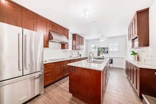 5808 Dalton Drive Nw, Calgary, AB - Indoor Photo Showing Kitchen With Stainless Steel Kitchen With Double Sink