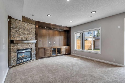 202 Coral Reef Manor Ne, Calgary, AB - Indoor With Fireplace