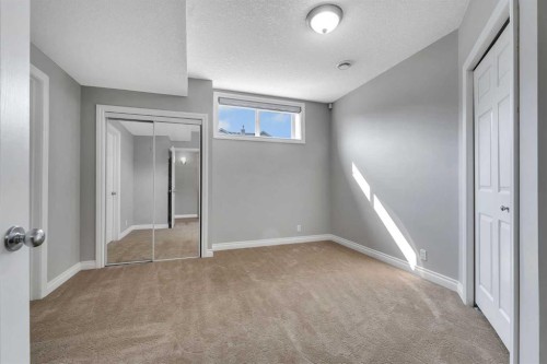 202 Coral Reef Manor Ne, Calgary, AB - Indoor Photo Showing Other Room