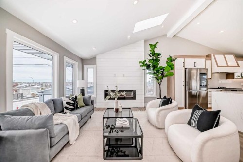 7 Lake Sundance Place Se, Calgary, AB - Indoor Photo Showing Living Room