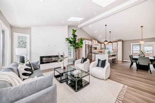 7 Lake Sundance Place Se, Calgary, AB - Indoor Photo Showing Living Room With Fireplace