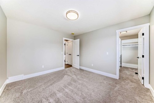 7 Lake Sundance Place Se, Calgary, AB - Indoor Photo Showing Other Room