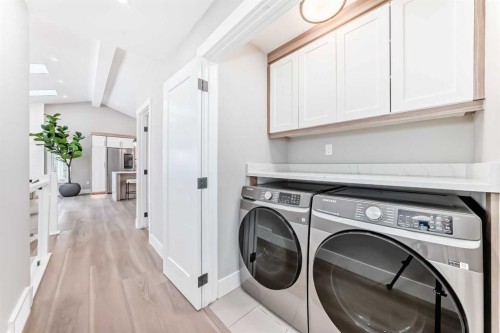7 Lake Sundance Place Se, Calgary, AB - Indoor Photo Showing Laundry Room