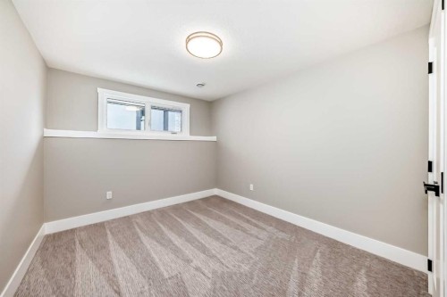 7 Lake Sundance Place Se, Calgary, AB - Indoor Photo Showing Other Room