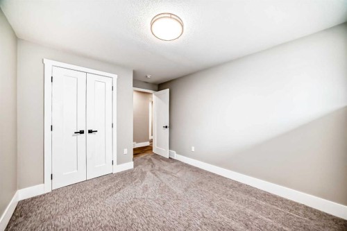 7 Lake Sundance Place Se, Calgary, AB - Indoor Photo Showing Other Room