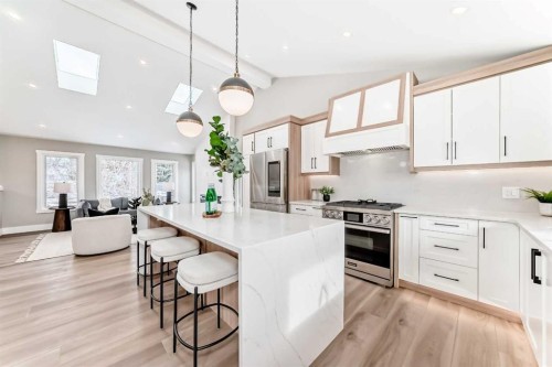 7 Lake Sundance Place Se, Calgary, AB - Indoor Photo Showing Kitchen With Upgraded Kitchen
