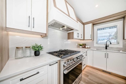 7 Lake Sundance Place Se, Calgary, AB - Indoor Photo Showing Kitchen With Upgraded Kitchen