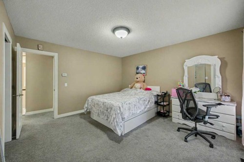 91 Panatella Close Nw, Calgary, AB - Indoor Photo Showing Bedroom